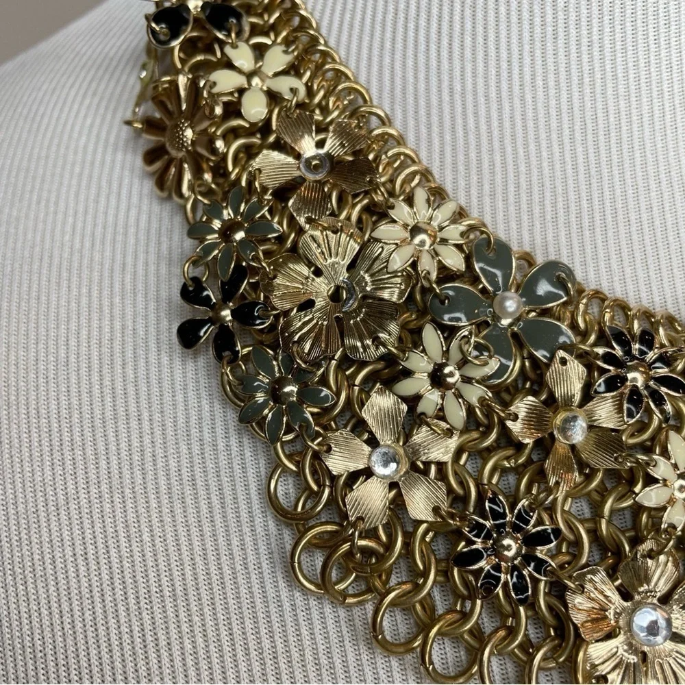 Gold Tone Floral Bib Necklace with Blue and Grey Accent Flowers - Picture 2 of 5